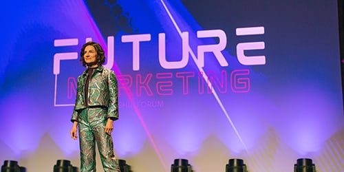 Suit standing on stage
