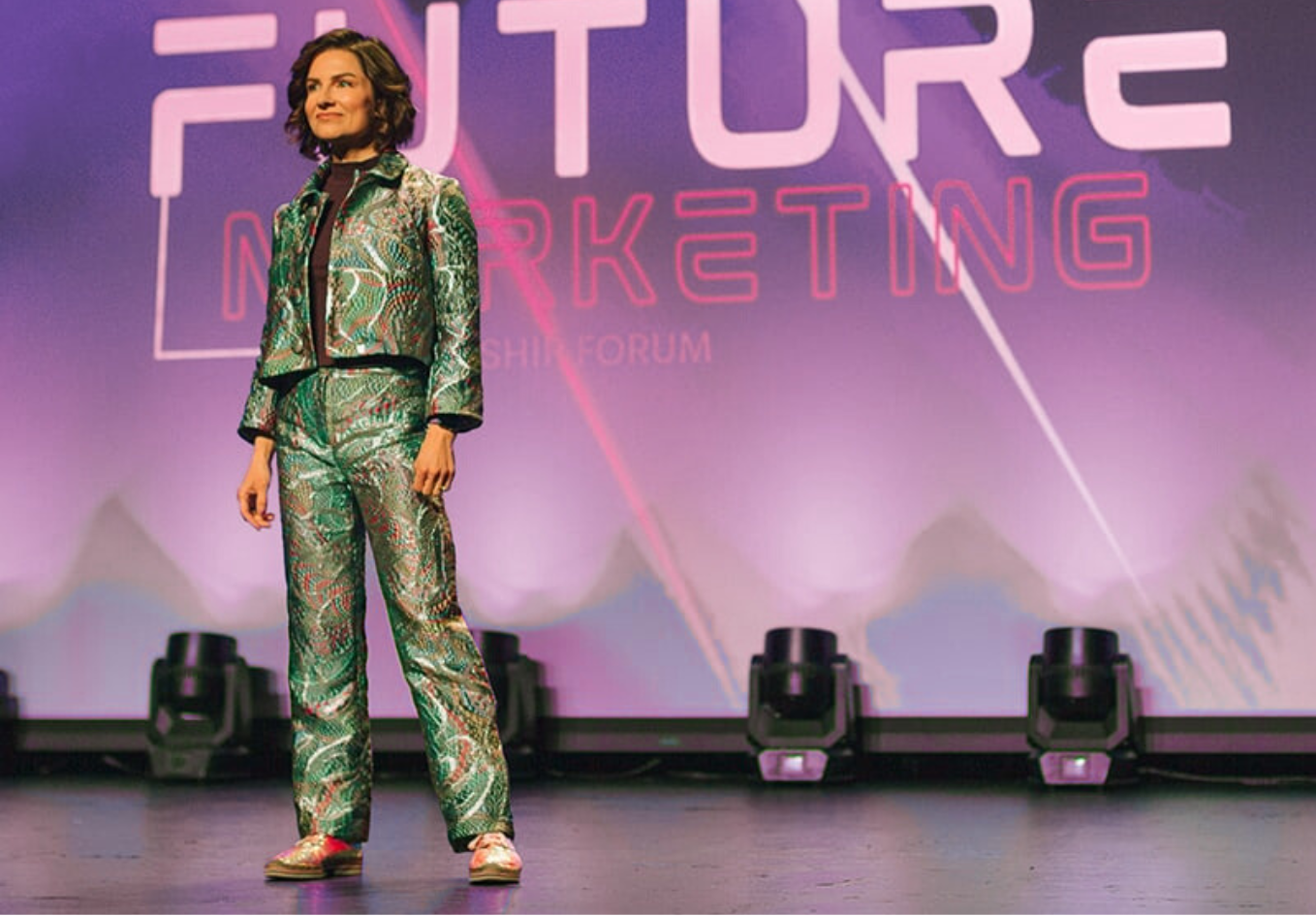 Suit standing on stage